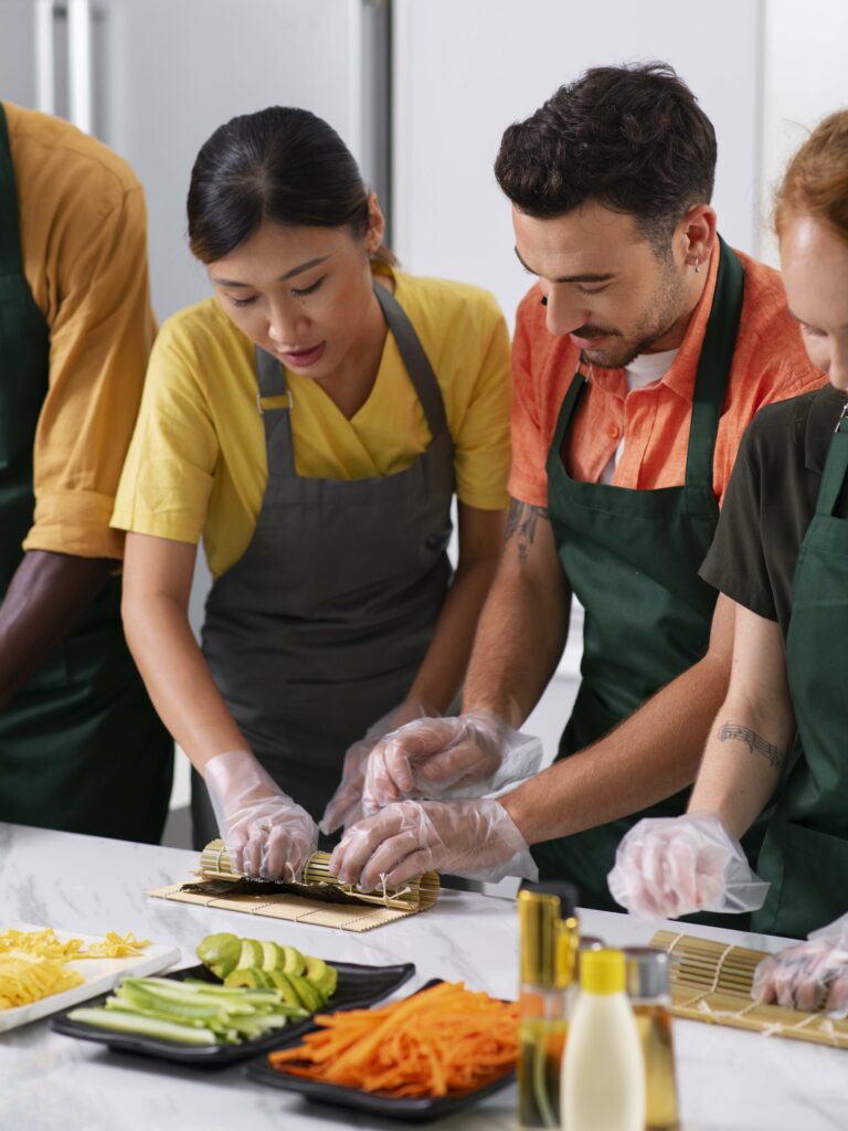 Une équipe cuisine ensemble pour une journée de cohésion teambuilding